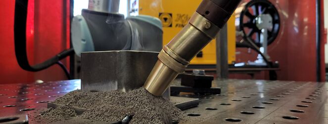 SAW torch during submerged arc welding of a component